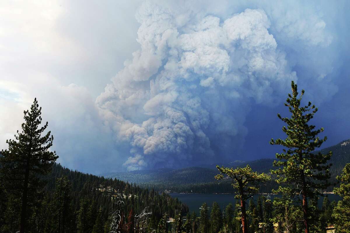 The Creek Fire burns near Huntington Lake on Saturday. The blaze has contributed to concerns over the state’s power grid by shutting down a Madera County power station.