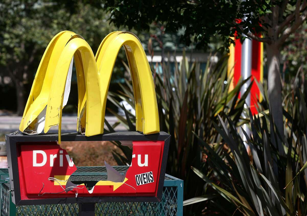 A McDonald's restaurant is shuttered at Telegraph Avenue and 45th Street Oakland, Calif. on Wednesday, July 1, 2020. Health officials ordered the fast food restaurant to shut down after several employees contracted the COVID-19 coronavirus.