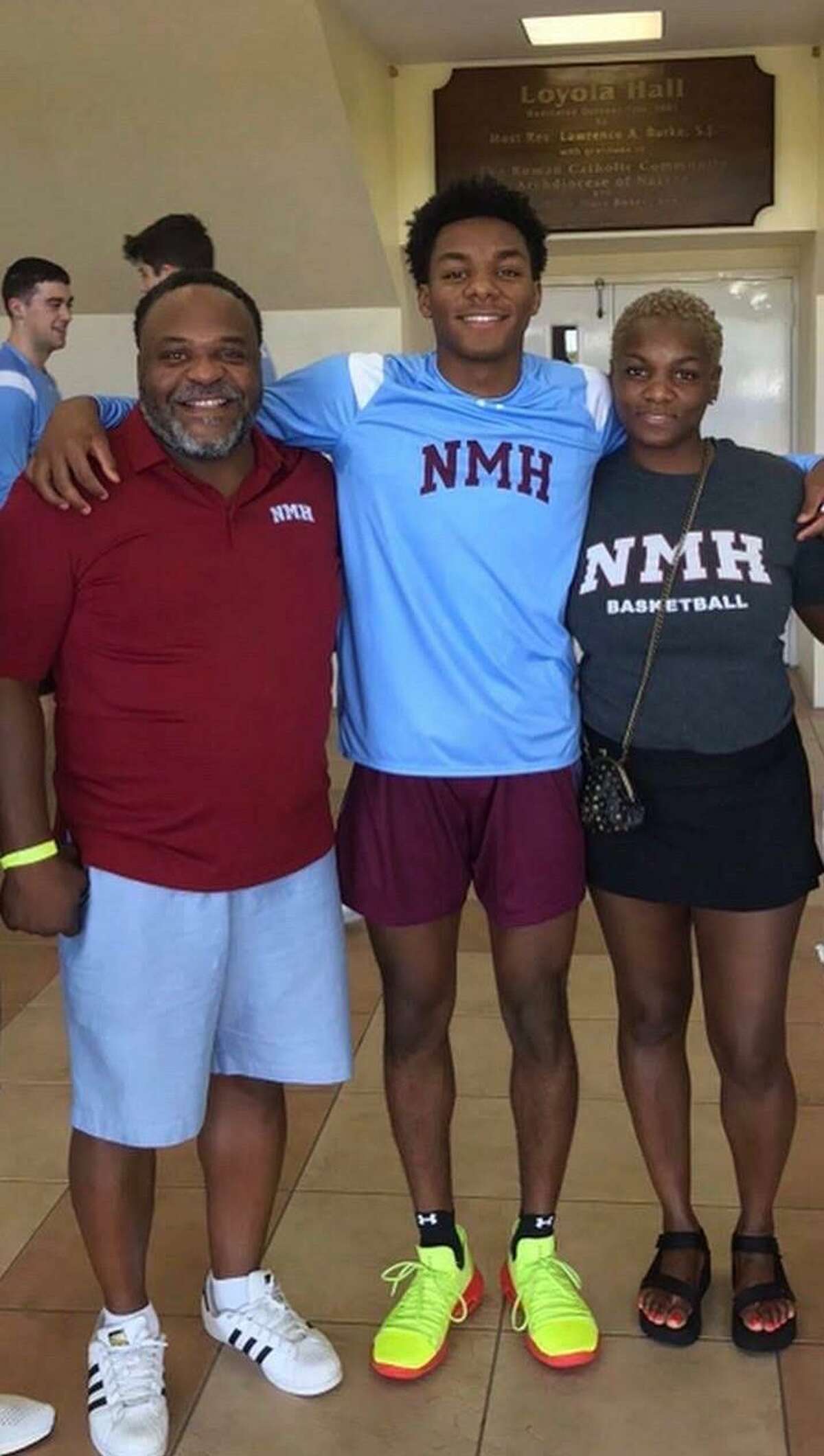 Top basketball recruit Avery Brown, center, flanked by his father, Antonio Jr. and mother, Joy.
