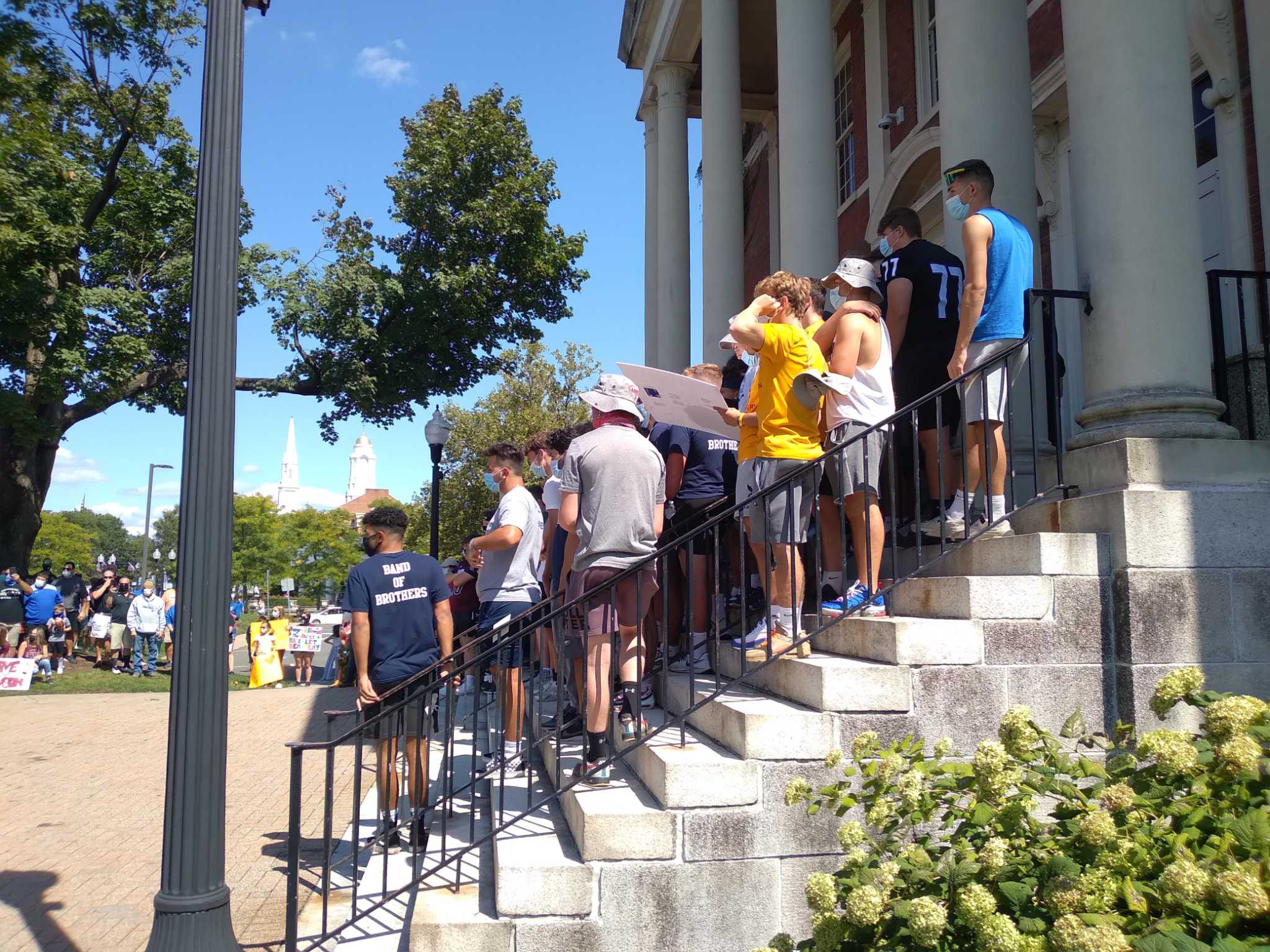 Players rally in West Hartford for a football season