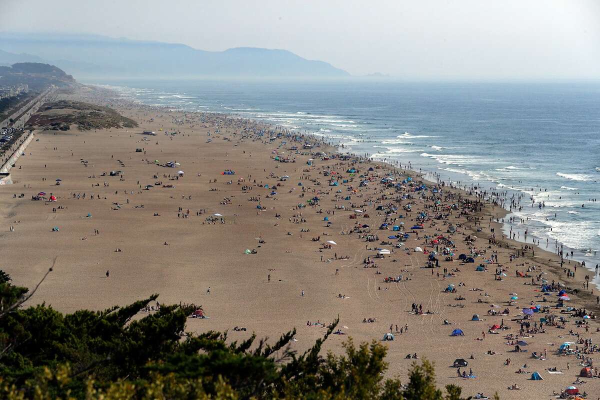 People took advantage of the cooler temperatures at Ocean Beach as the hot weather toppled records all over the Bay Area, with the previous record of 92 easily beat by the high of 100 in San Francisco, Calif., on Sunday, September 6, 2020.