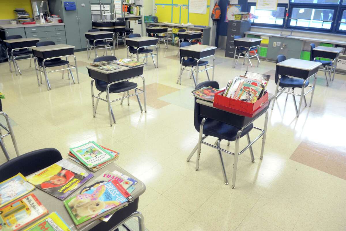 Desks are placed at a safe social distance in a classroom at Naramake School, in Norwalk, Conn. Aug. 26, 2020.