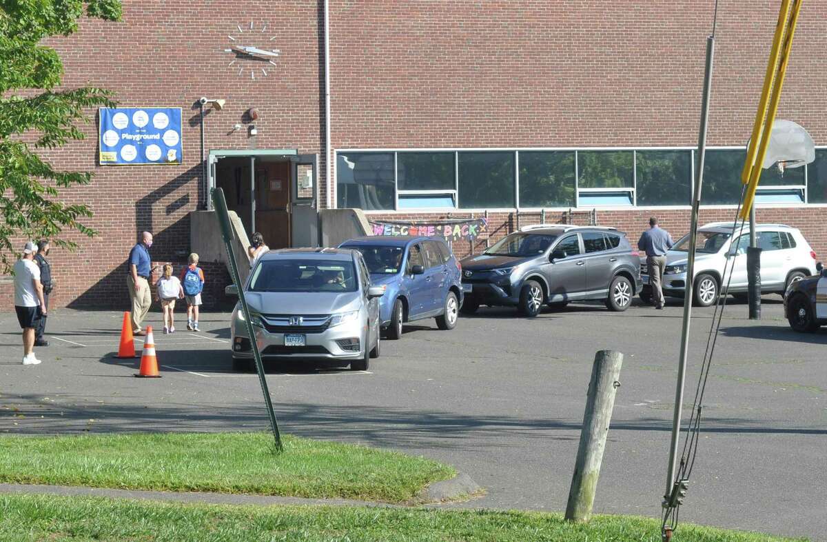 Parents dropped students off behind Veterans Park Elementary School on Friday, Sept. 4.