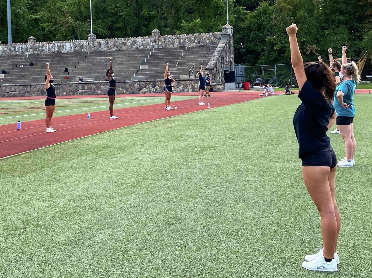 Members of the Stamford cheerleading team practice on Thursday, Sept. 3, 2020 at Boyle Stadium in Stamford, Conn.