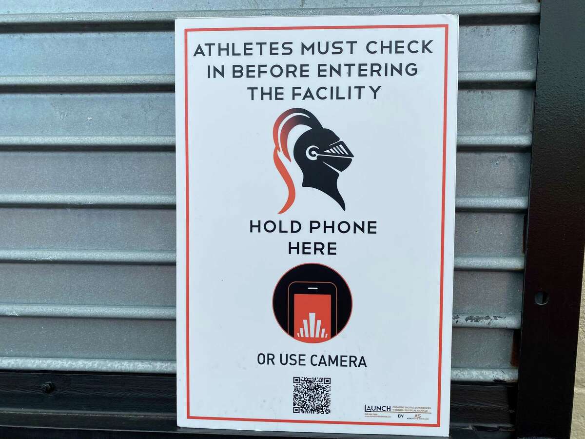A sign on display allows Stamford High School athletes to scan a QR code to be medically cleared each day. Sept. 3, 2020.
