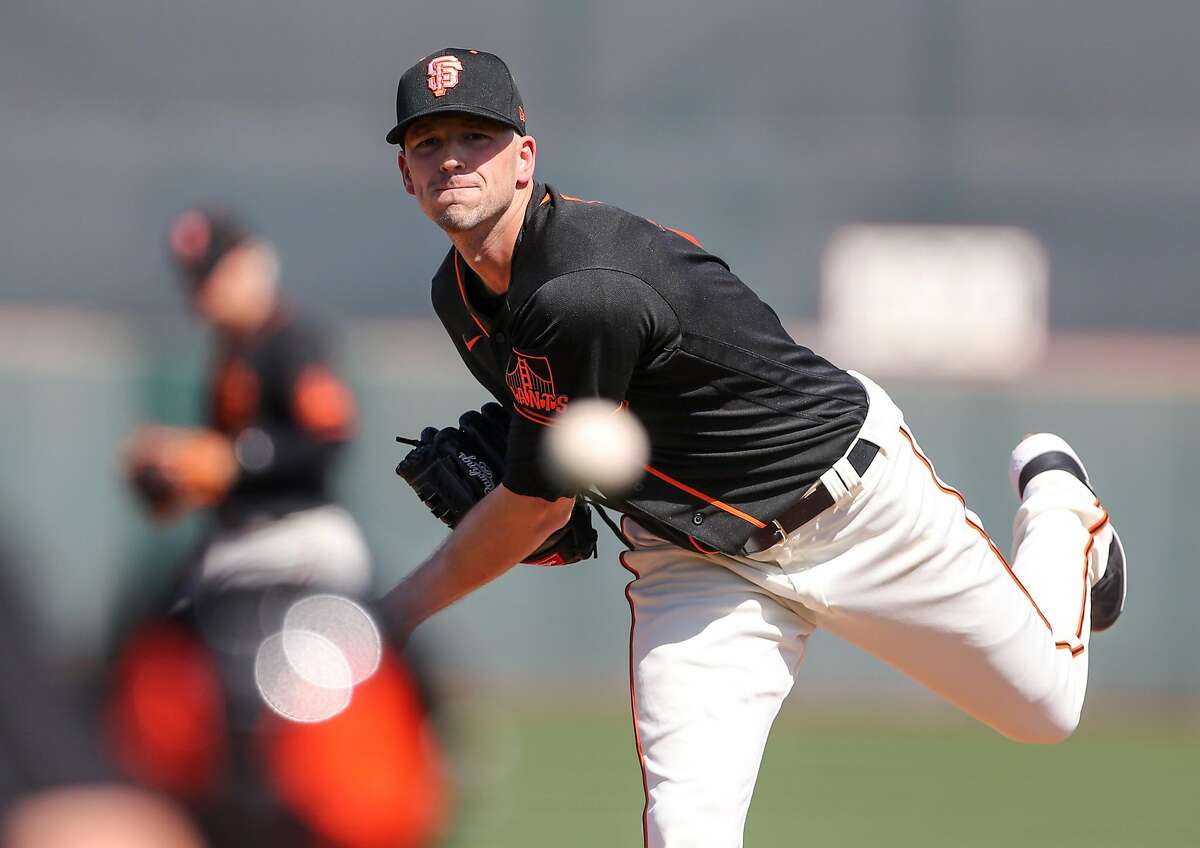 San Francisco Giants pitcher Drew Smyly delivers a pitch during their game with the Cleveland Indians at Scottsdale Stadium Thursday, March 5, 2020, in Scottsdale, Arizona.