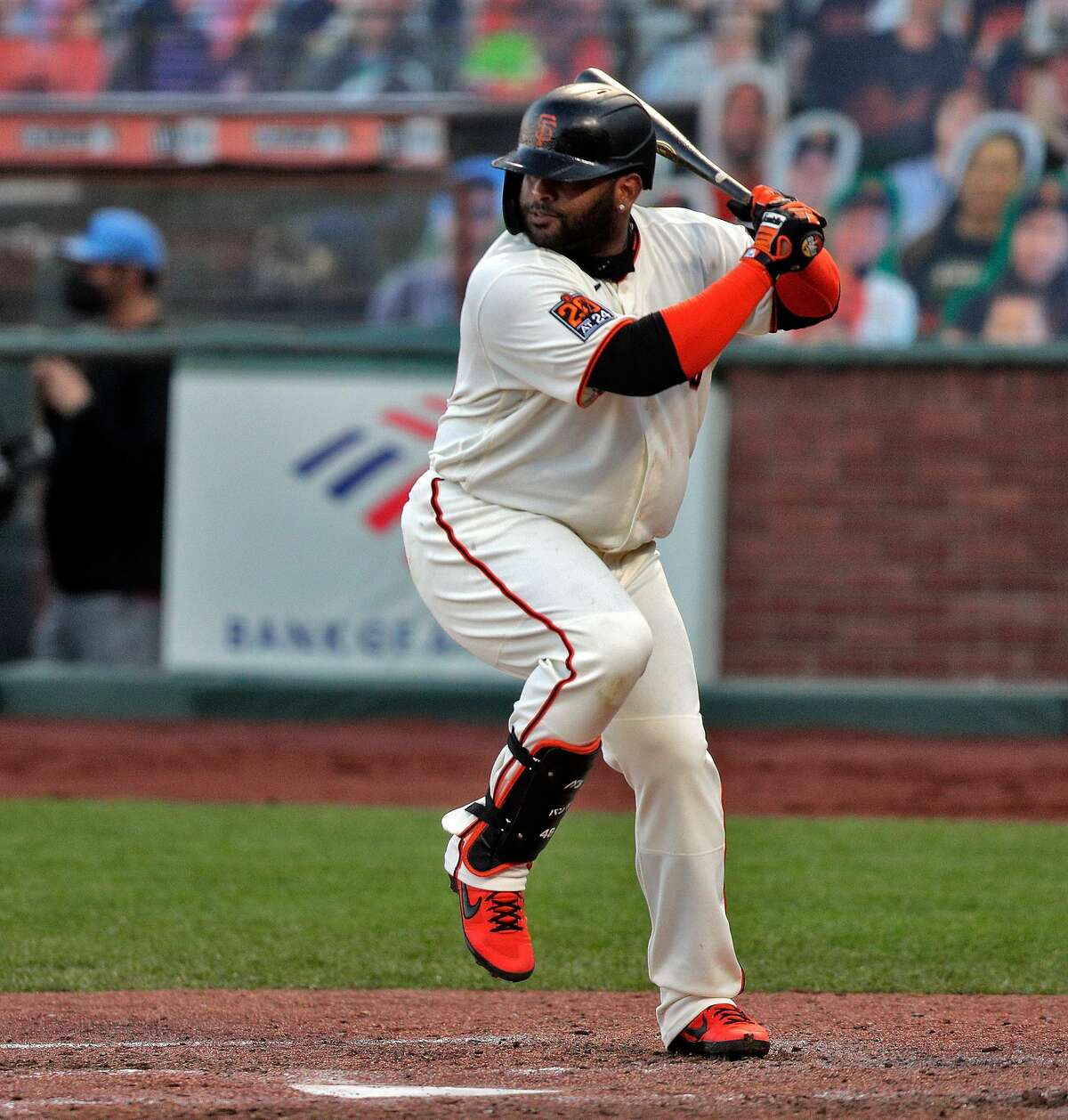 San Francisco Giants' Pablo Sandoval makes an off balance swing while  popping up to right with two runners on base to end the sixth inning  against the San Diego Padres in a