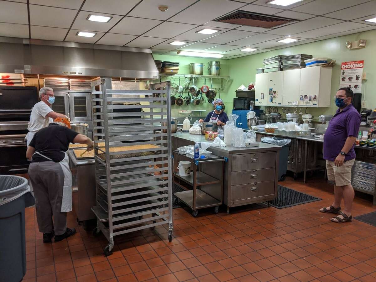 Volunteers prepare goodies for this Sunday's redefined Carrot Festival pick-up. (Provided)