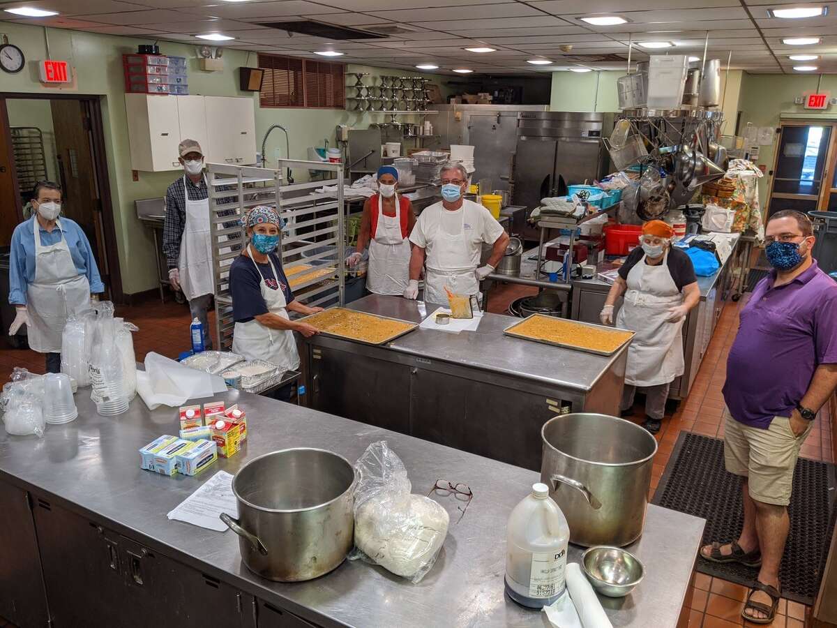 Volunteers prepare goodies for this Sunday's redefined Carrot Festival pick-up. (Provided)