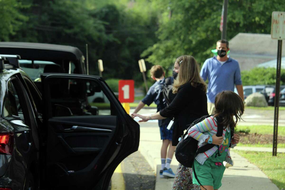 Coleytown Elementary School principal Janna Sirowich helped welcome students on their first day back at school. Taken Sept. 8, 2020 in Westport, Conn. With the reopening of schools comes excitement and anxiety but a familiar atmosphere will help to comfort families as they navigate the new school year, she said. Once students are back in the building they can also see that their classrooms are largely not that different - despite some changes. "Yes it's different, but there's a lot of things that are the same," Sirowich said. "I think that's going to help our children as they start the school year."