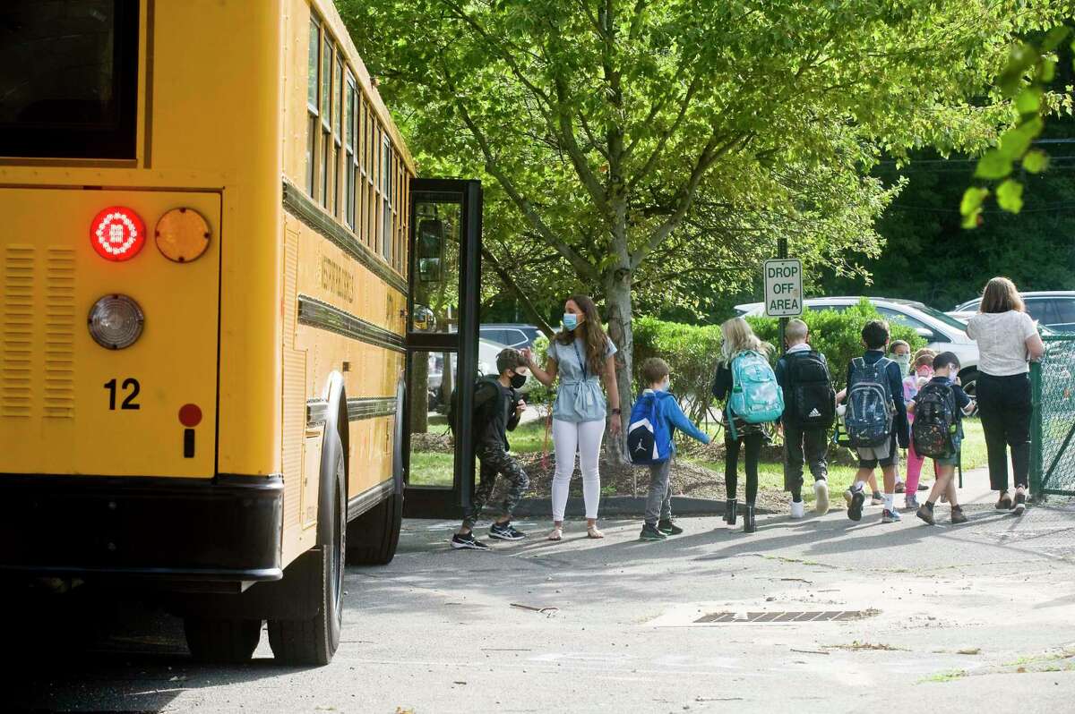 Kids arrive for the first day of school at Coleytown Elementary School. Tuesday, Sept. 8, 2020