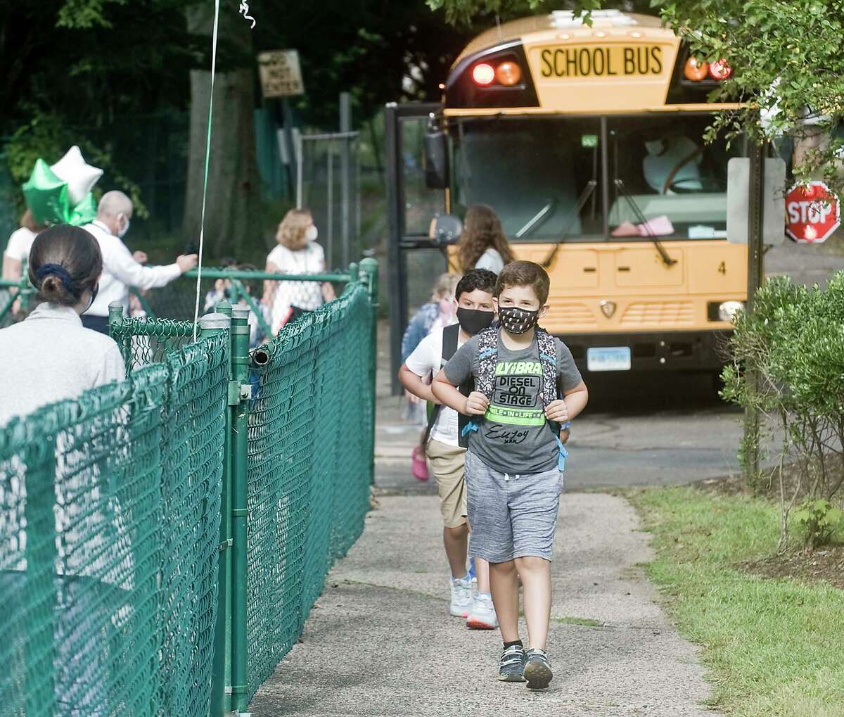 Kids arrive for the first day of school at Coleytown Elementary School. Tuesday, Sept. 8, 2020