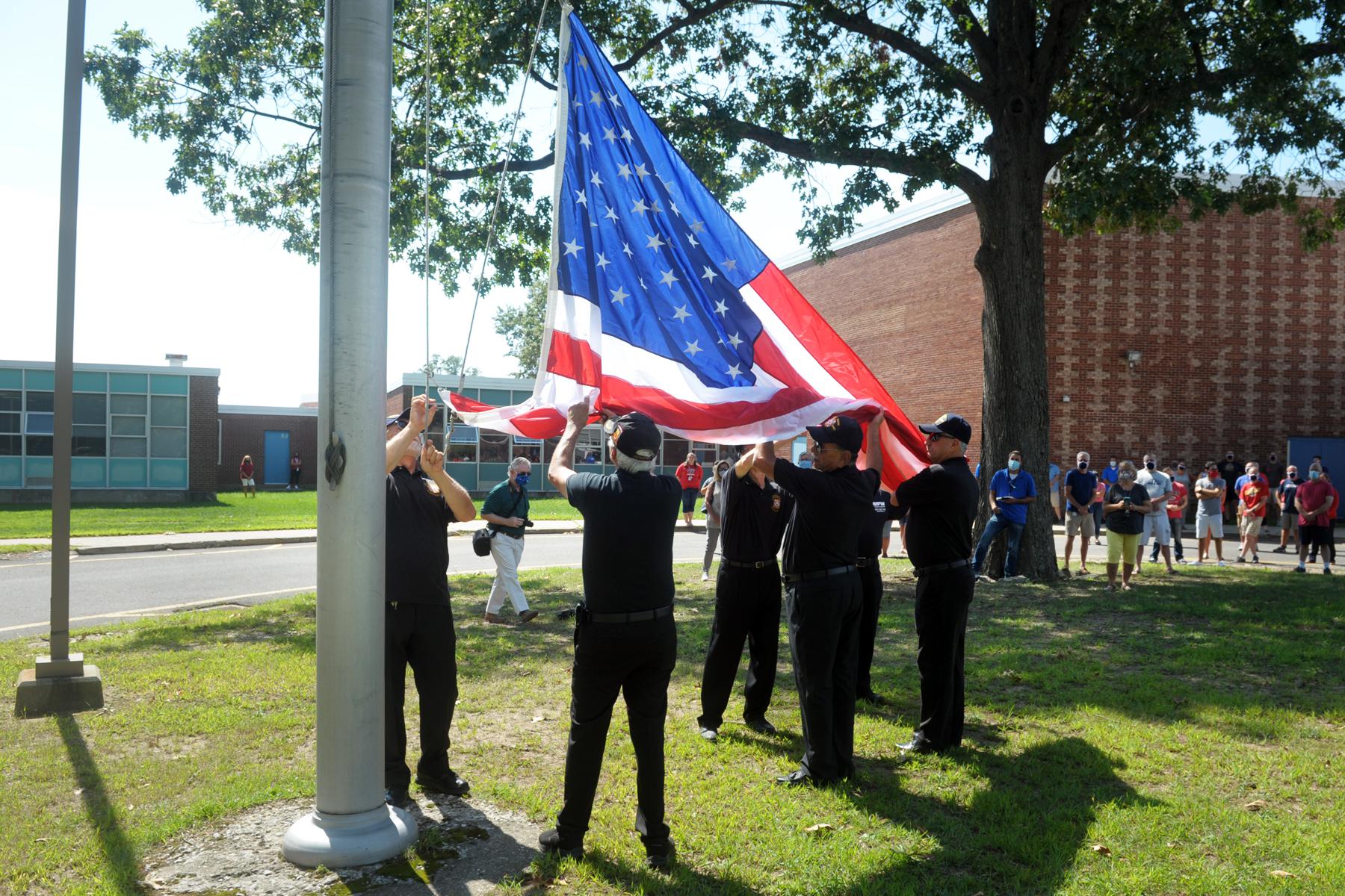 Stratford veterans present new flag to high school