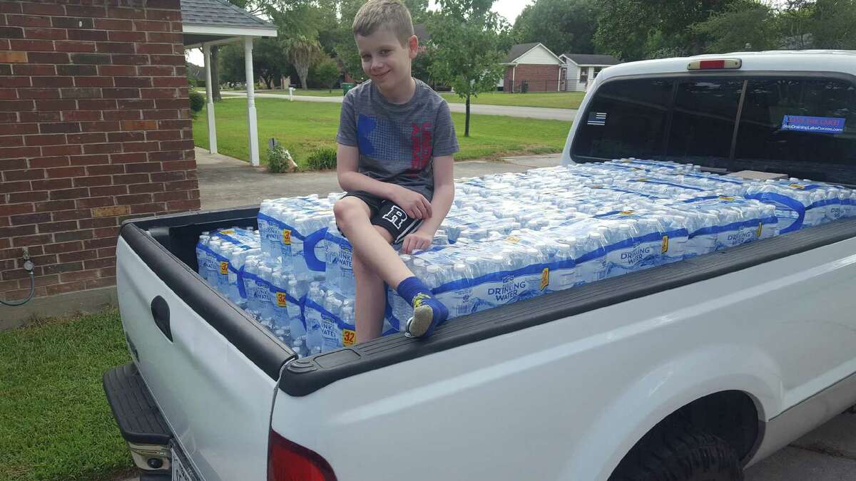 Gunnar Ruthstrom, 7, of Lake Conroe helped collect and deliver a truck load of water to those impacted by Hurricane Laura in Louisiana.