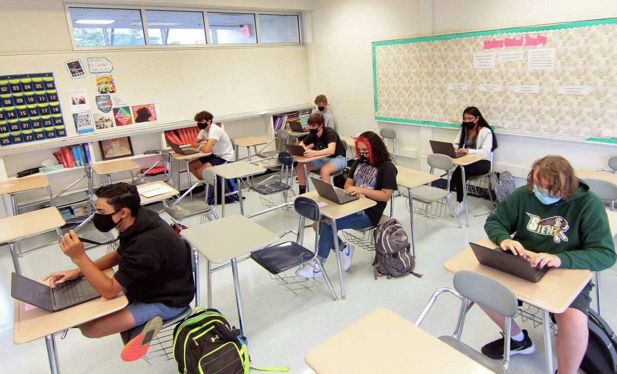 Fairfield Ludlowe High School students attend a class during the first day of school for Fairfield Public Schools in Fairfield, Conn., on Tuesday Sept. 8, 2020.