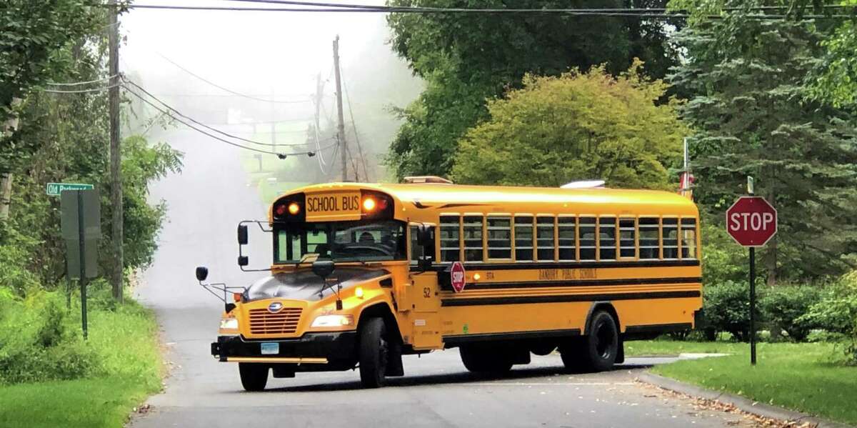 Spectrum/New Milford Public Schools. A bus makes its way on Stephanie Drive in New Milford.