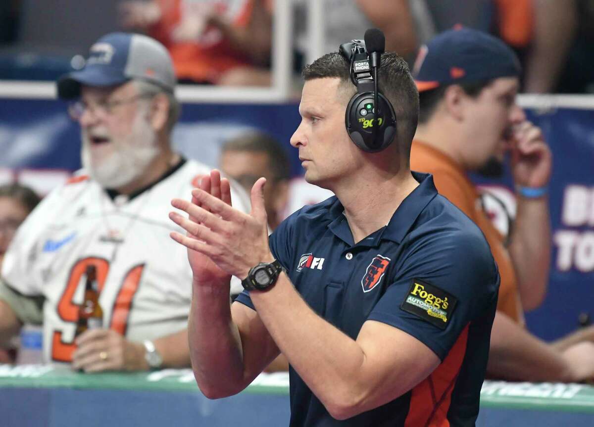 Albany Empire's head coach Rob Keefe applauds his players as they play the Philadelphia Soul during the ArenaBowl XXXII football game at the Times Union Center, Sunday, Aug. 11, 2019, in Albany, N.Y. (Hans Pennink / Special to the Times Union)
