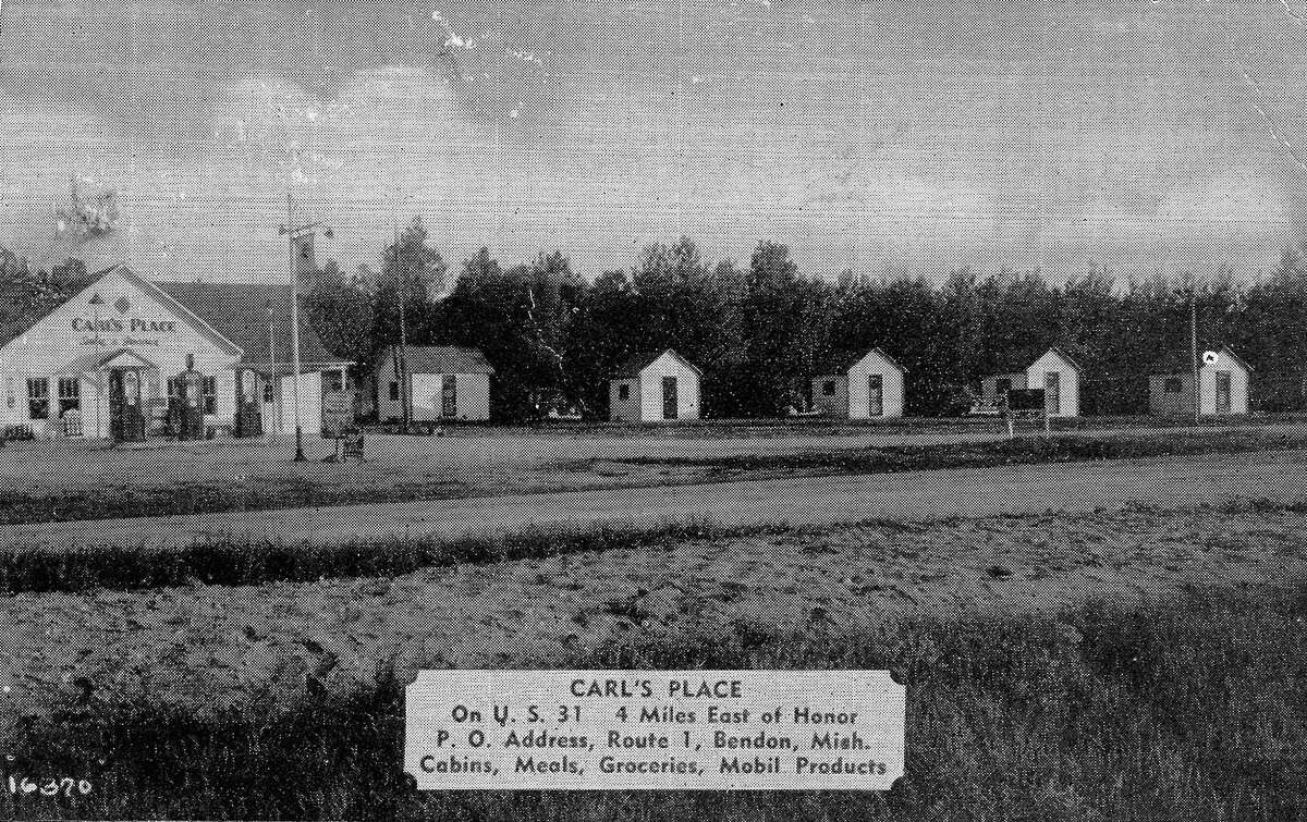 Carl's Place, circa 1940s, was a gas station, store, restaurant and tiny tourist cabins at the corner of US 31 and C R 669, by the fish hatchery. (Courtesy Photo)
