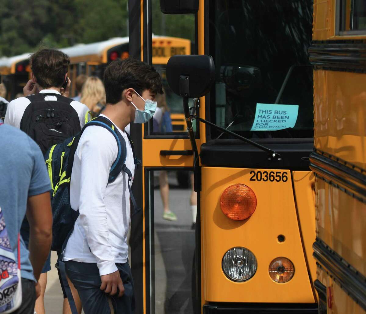 Students from the first cohort are dismissed to make way to the second cohort at Greenwich High School in Greenwich, Conn. Wednesday, Sept. 9, 2020.