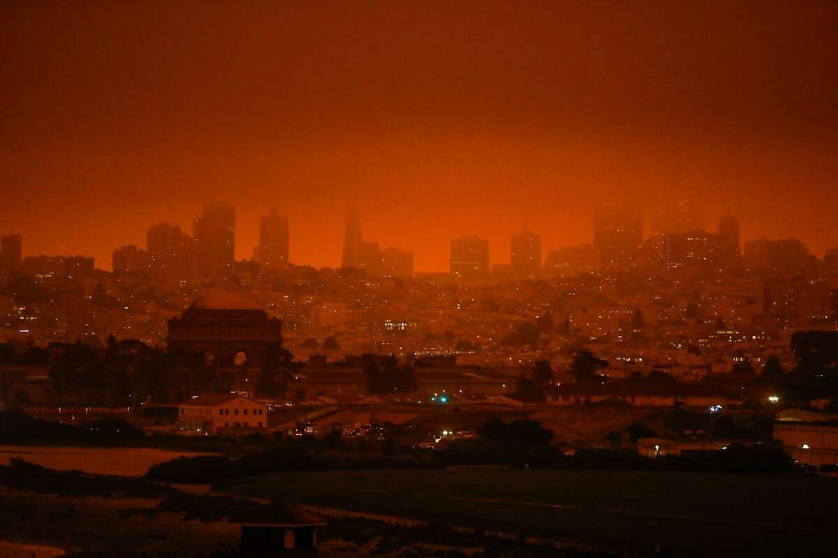 A view of the downtown San Francisco shrouded in dark orange smoke in San Francisco, Calif. Wednesday, September 9, 2020 due to multiple wildfires burning across California and Oregon.