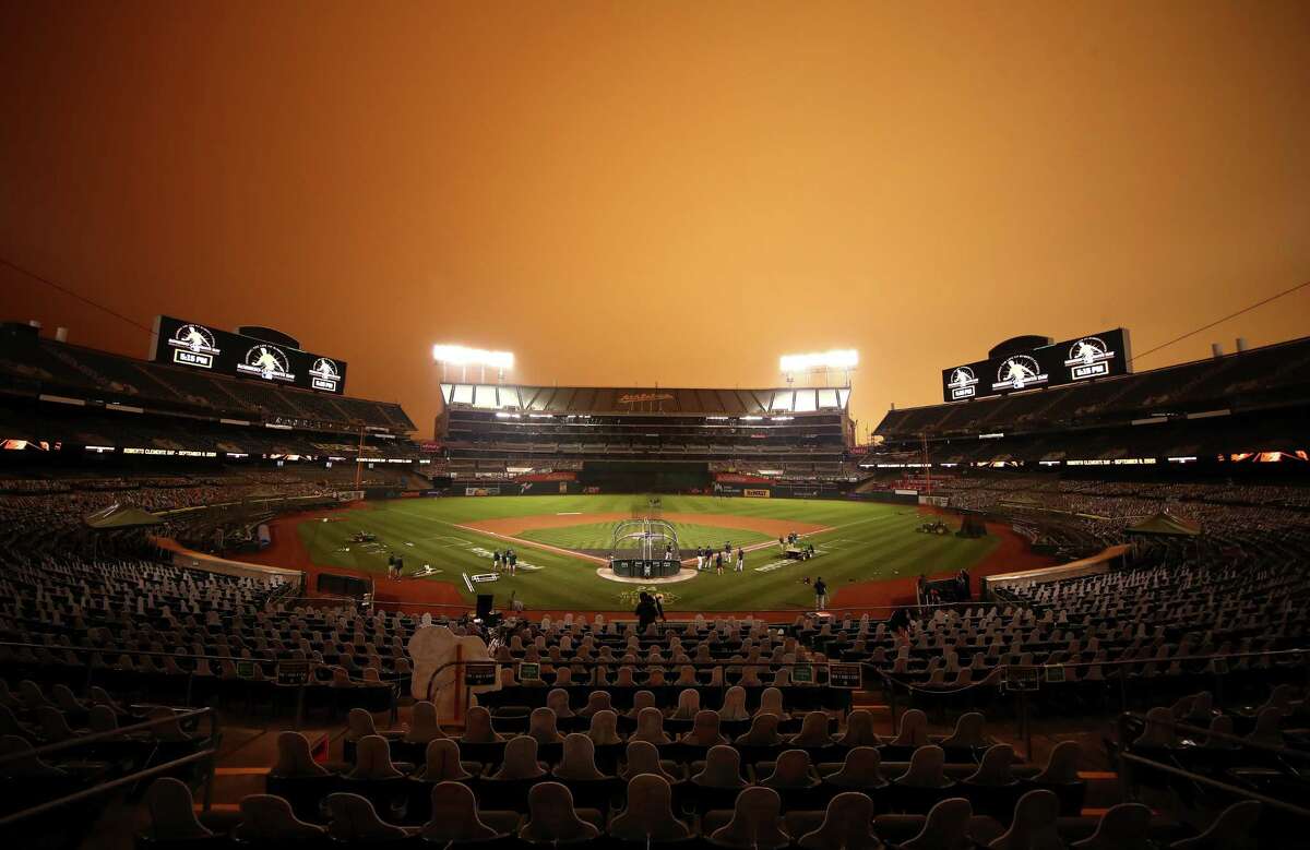 PHOTOS: More of the eerie orange sky at the Astros-A's baseball game The Houston Astros take batting practice before their game against the Oakland Athletics at RingCentral Coliseum on September 09, 2020 in Oakland, California.