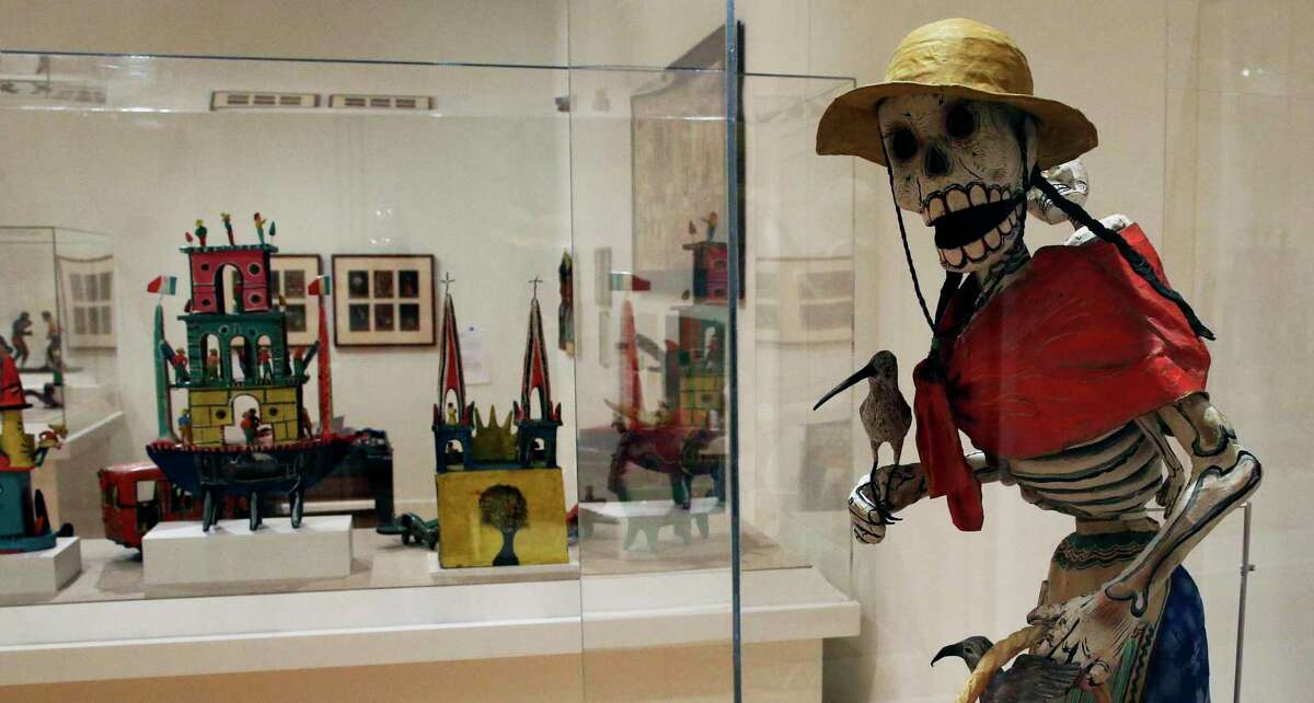 “Skeleton Street Vendor,” a 1965 papier-mache piece by Miguel Linares, can be seen in the Latin American Popular Art Gallery at the San Antonio Museum of Art.