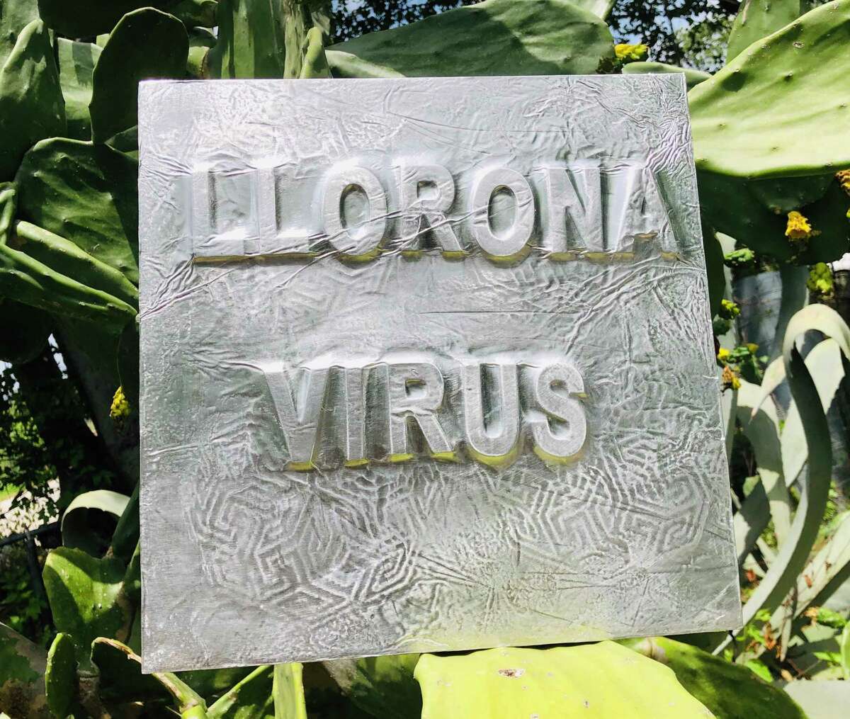 "Llorona Virus" by San Antonio artist Jose Chapa, who specializes in embossed metal work. Chapa created the work as a nod to the pandemic and 2020.