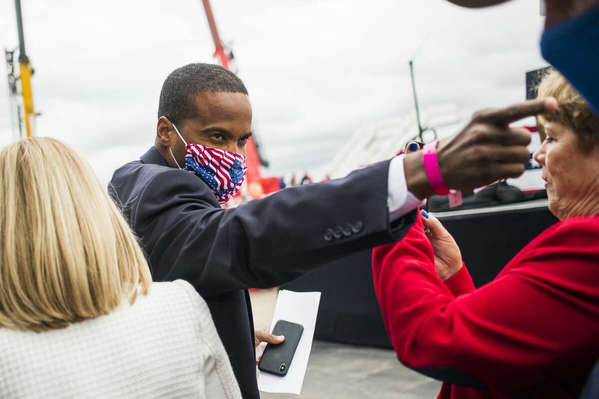 U.S. Senate candidate John James greets fellow supporters of President Donald Trump as he arrives at MBS International Airport for the President's campaign rally Thursday, Sept. 10, 2020 in Freeland. (Katy Kildee/kkildee@mdn.net)