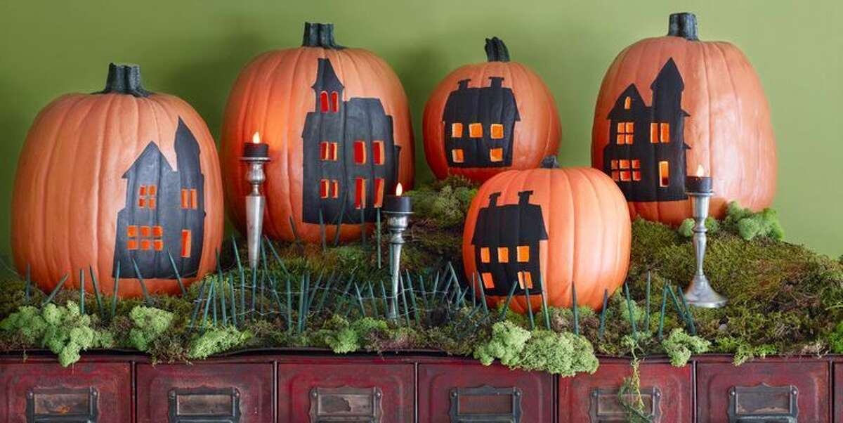 It's no secret that we love a good carved pumpkin for Halloween. But forget the same old pumpkin decorating ideas you've been doing year after year and take a zombie crawl to the spookier side. Mix up your DIY Halloween decorations with an easy idea from our roundup that's full of inspirational designs that are so much cooler than the standard, grinning jack-o'-lantern.