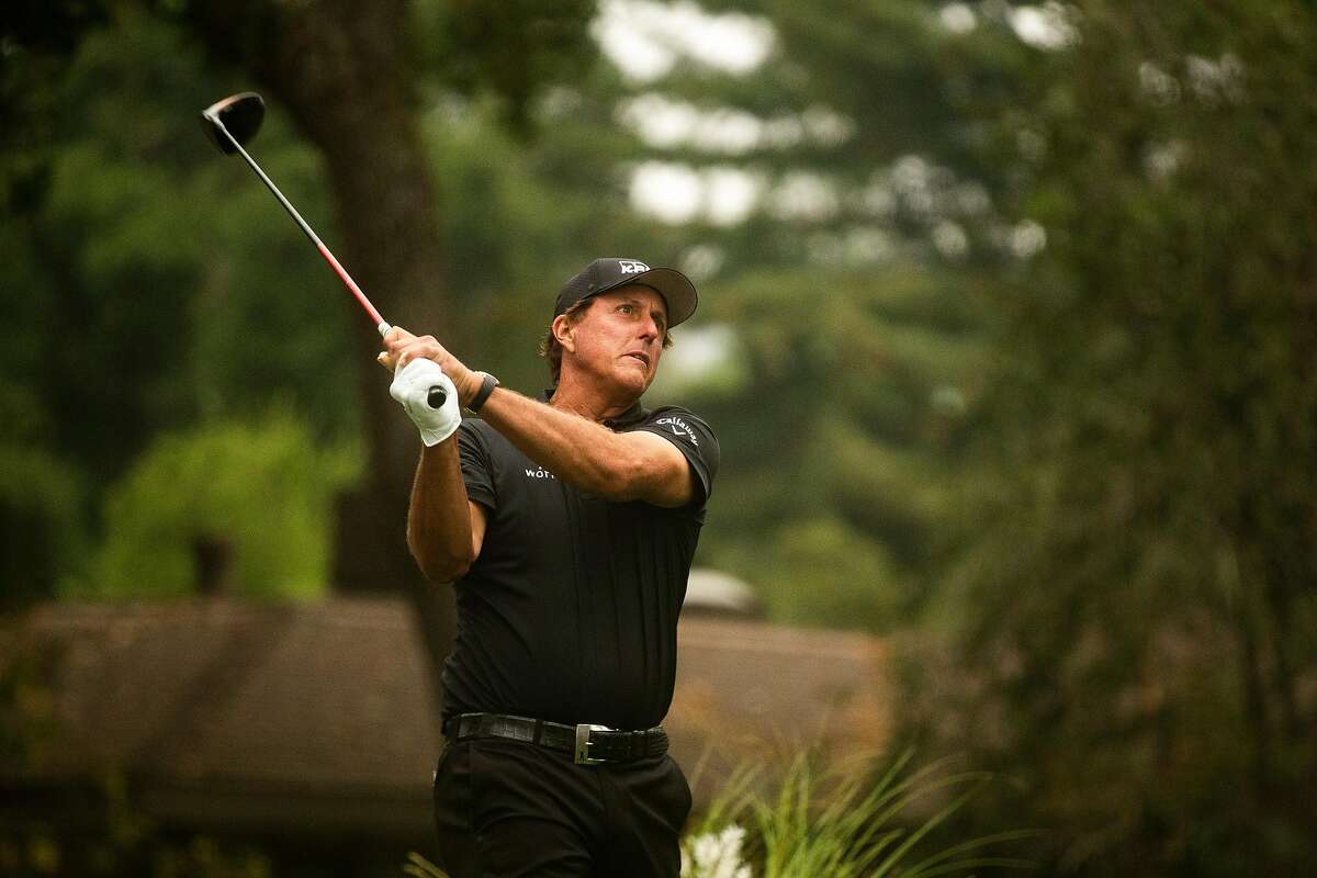 Phil Mickelson hits his tee shot on the 18th hole during round one in the Safeway Open golf tournament at the Silverado Resort and Spa Thursday, Sept. 10, 2020, in Napa, Calif.