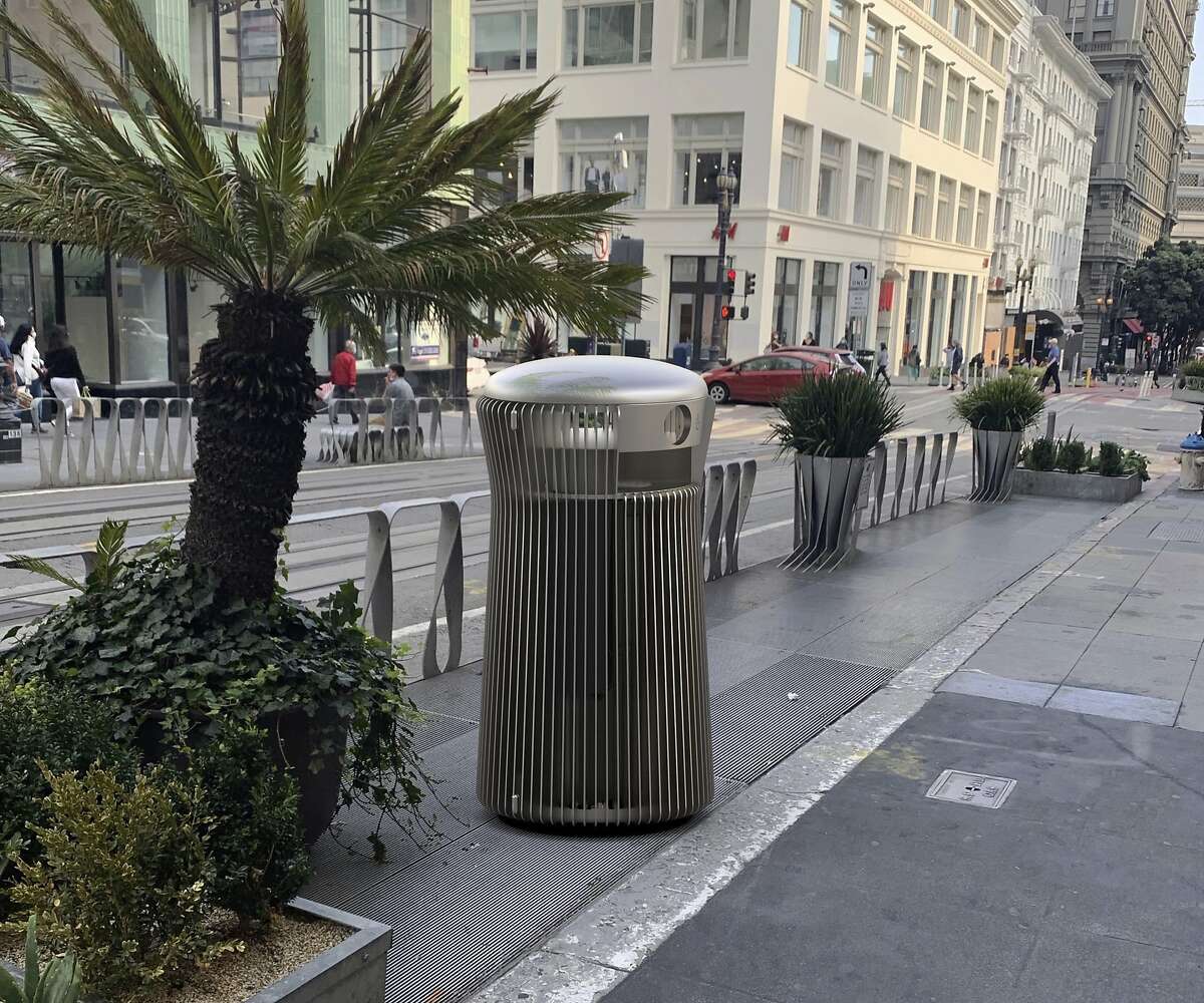 A rendering that shows one of the three contenders for San Francisco's new trash can, "salt and pepper," on Powell Street. San Francisco Public Works will select a replacement for the current green receptacles after prototypes are put on display for public review.