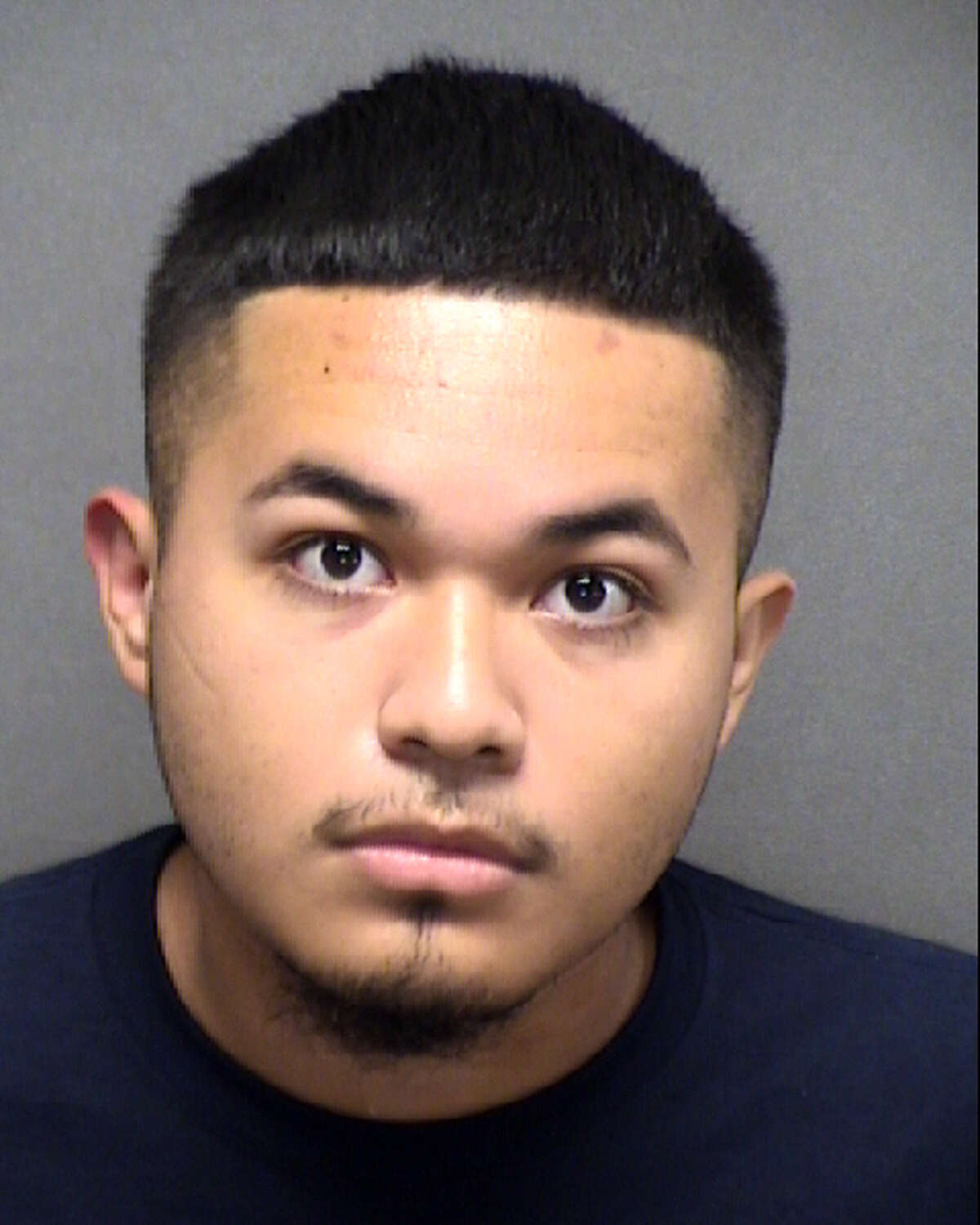 Thomas Esquivel, 19, was charged with endangering a child after videos surfaced of him giving a 3-year-old child a blunt, according to the Bexar County Sheriff's Office.