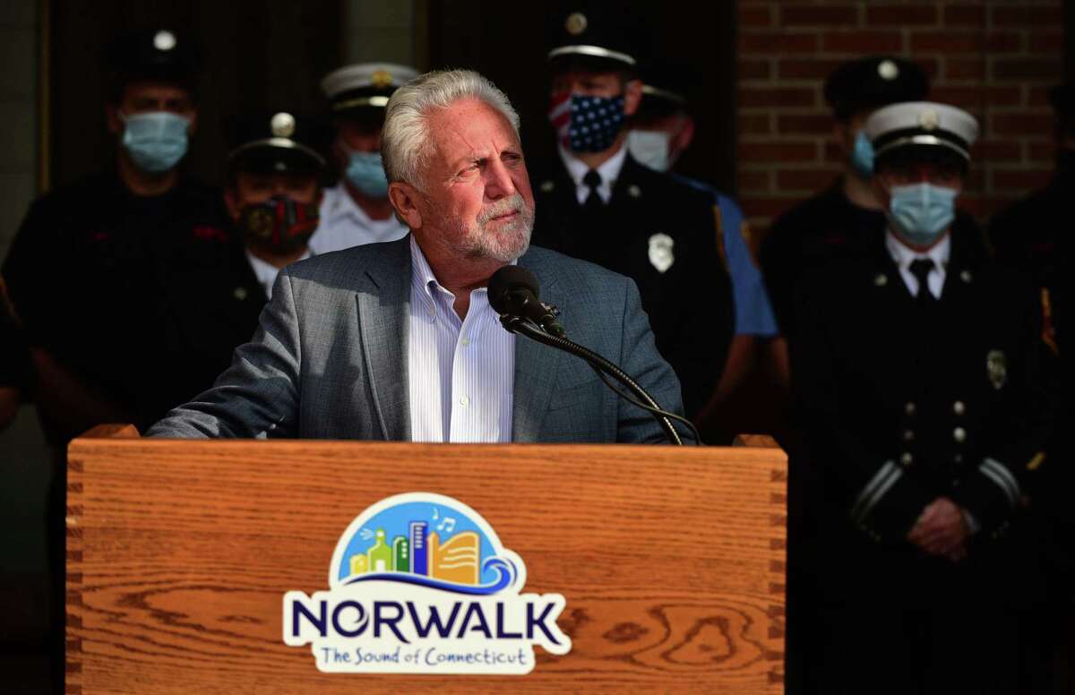 Norwalk mayor Harry Rilling gives his opening remarks as the City of Norwalk holds its annual 9/11 Remembrance Ceremony outside of City Hall Friday, September 11, 2020, in Norwalk, Conn. The mayor led the ceremony with members of the police and fire departments in attendance.