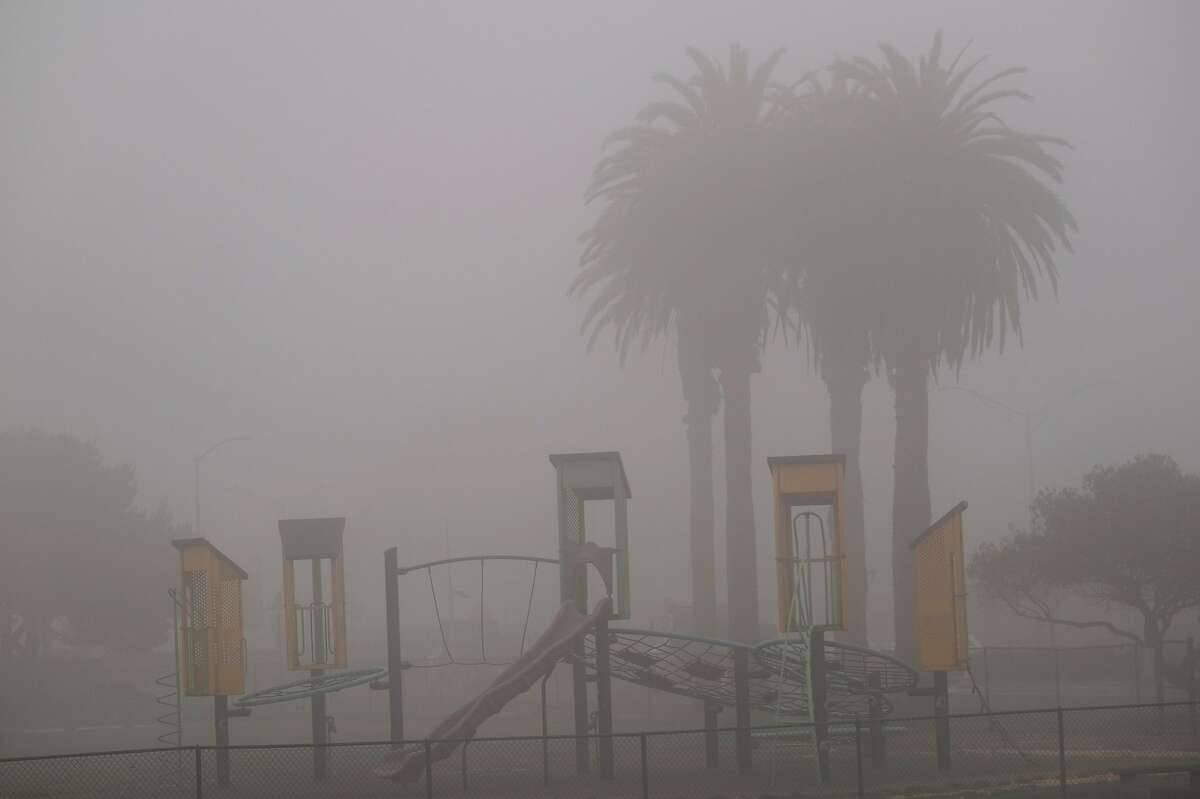 A playground sits empty in dense smoke and fog on Treasure Island, San Francisco on Friday, September 11, 2020. San Francisco continues to experience extremely poor air quality due to the wildfires.