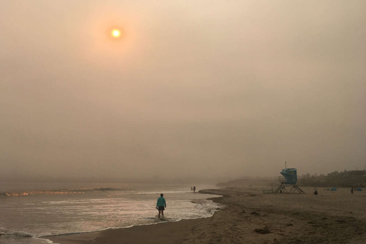 Smoke from wildfires obscures the sun in Santa Cruz, California.