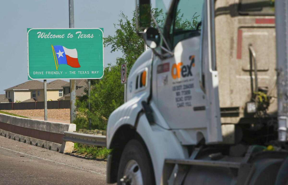 A tractor trailer crosses the World Trade Bridge back into the United States from Mexico in 2019. Trade is big in Texas, and the USMCA was a crucial update.