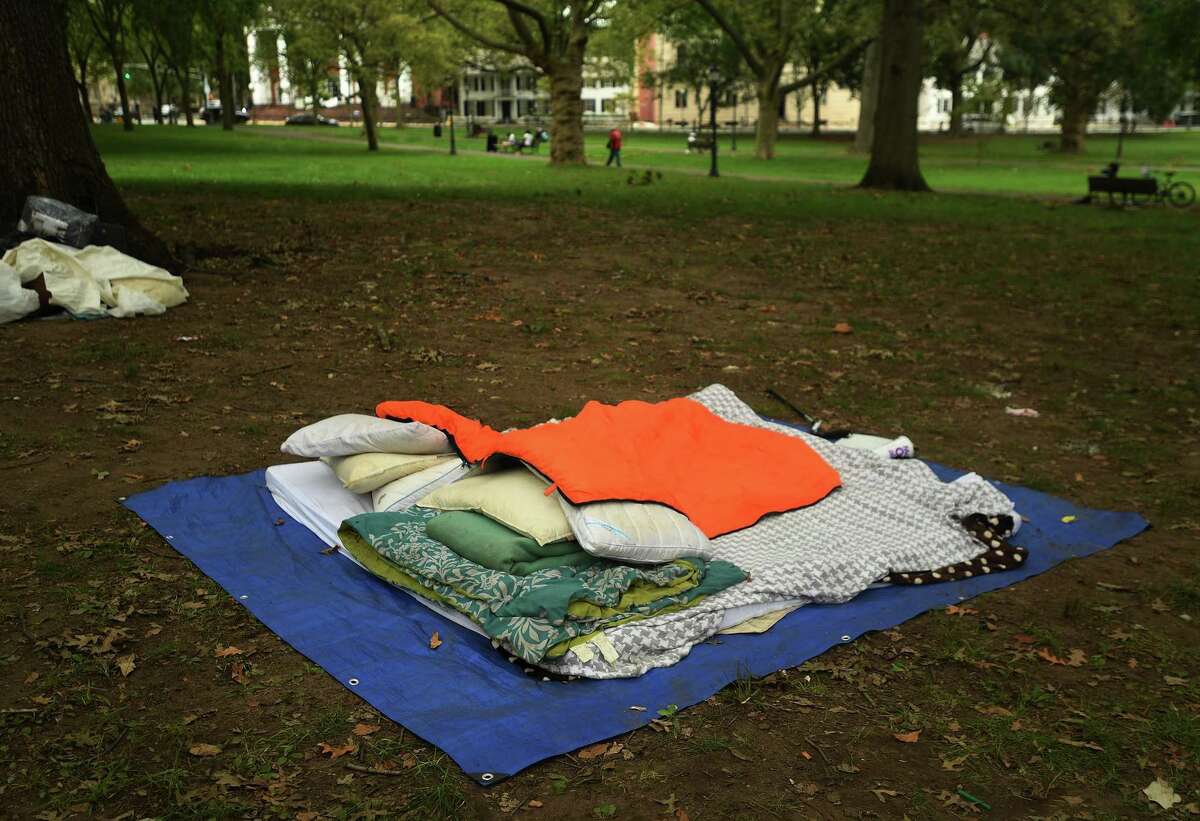 A homeless person’s sleeping setup on the Green in New Haven.