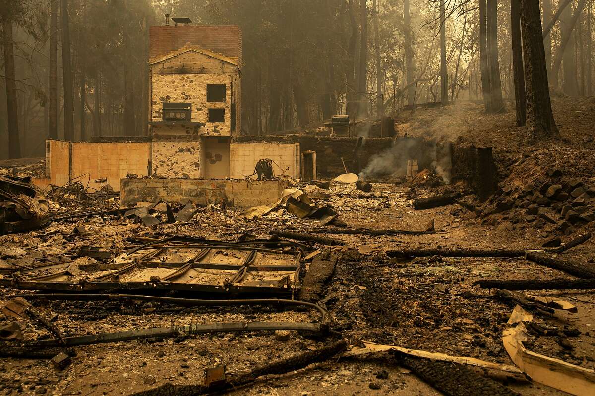 A destroyed home in the aftermath of the North Complex fire at Lake Madrone, Friday, Sept. 11, 2020, in Berry Creek, Butte County, Calif.
