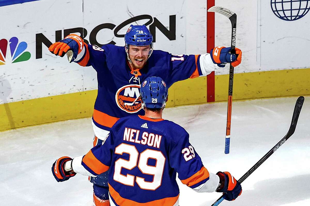EDMONTON, ALBERTA - SEPTEMBER 11: Anthony Beauvillier #18 of the New York Islanders is congratulated by Brock Nelson #29 after scoring a goal against the Tampa Bay Lightning during the second period in Game Three of the Eastern Conference Final during the 2020 NHL Stanley Cup Playoffs at Rogers Place on September 11, 2020 in Edmonton, Alberta, Canada. (Photo by Bruce Bennett/Getty Images)
