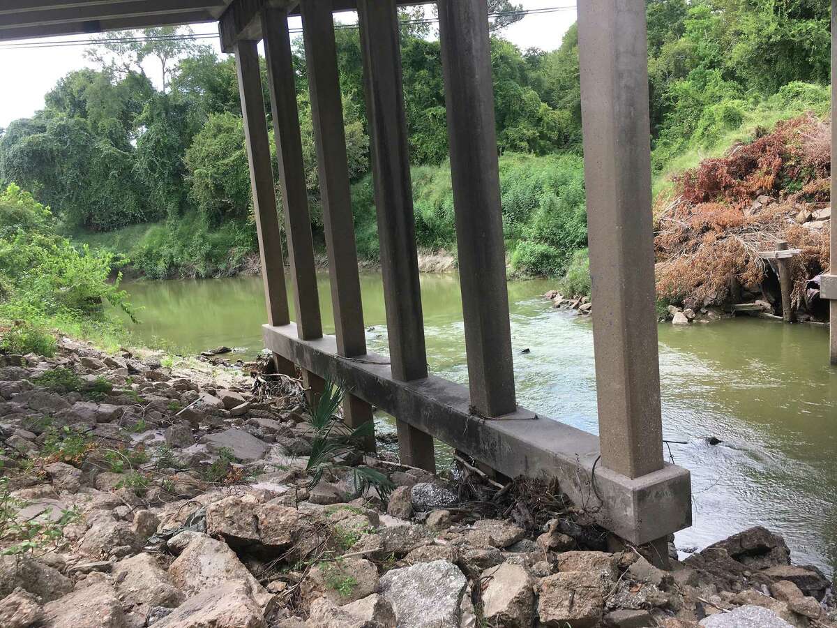 Five HOA's are asking the Texas Department of Transportation to cleanup debris under the I-45 bridge at Cypress Creek. TxDOT says the concrete chunks are there intentionally to shore up the foundation of the bridge.
