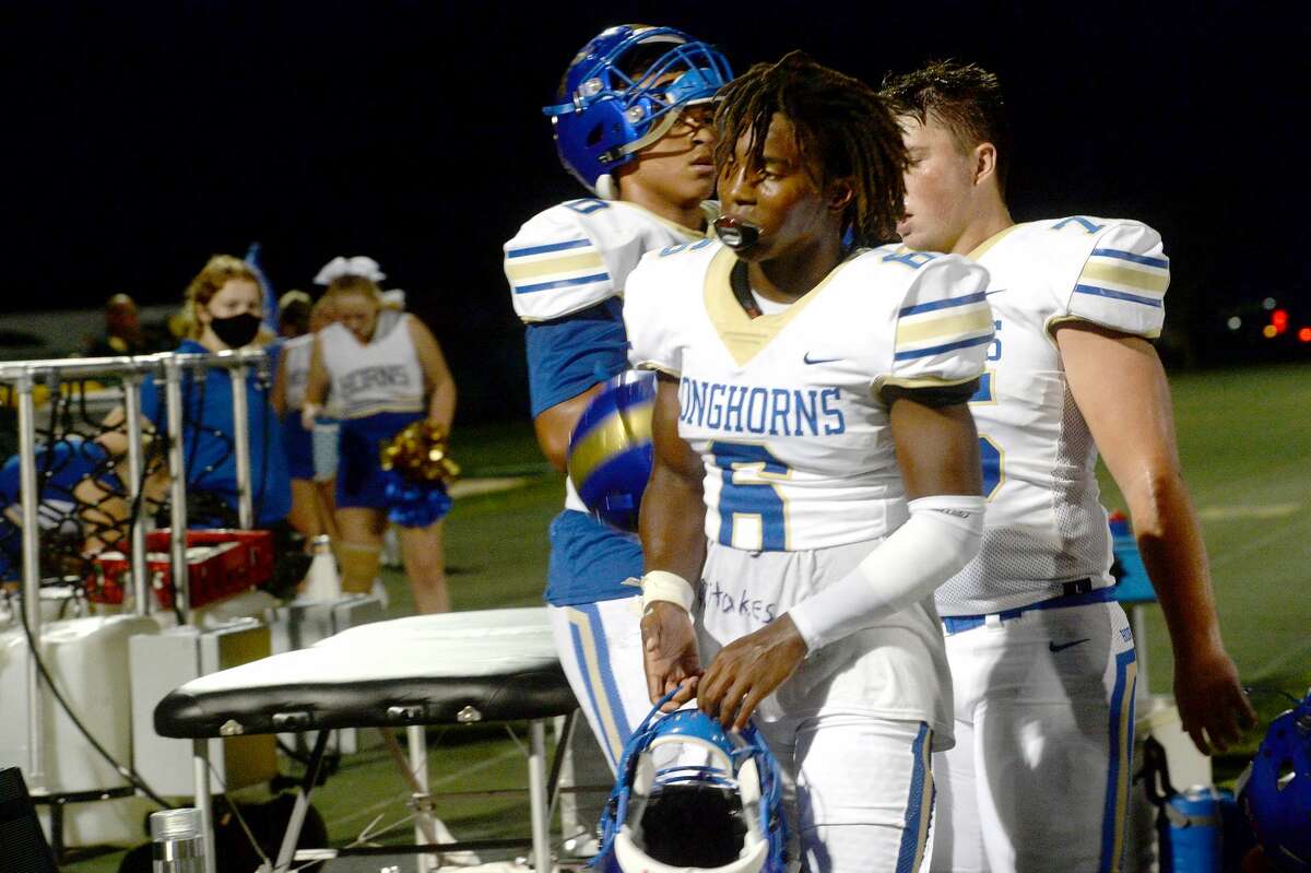 Hamshire-Fannett's D'onte Zeno comes in off the field as the defense takes over during their match for the Rice Bowl win Friday night in Winnie. Photo taken Friday, September 11, 2020 Kim Brent/The Enterprise