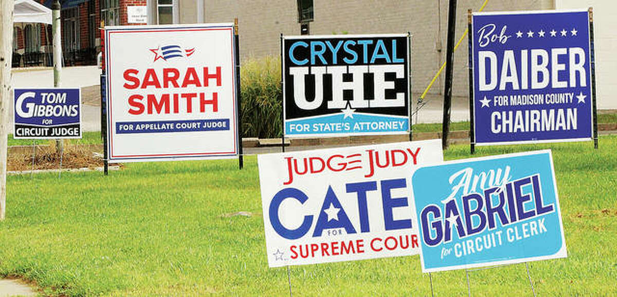 One of many grouping of election signs stands on Godfrey Road last week as the area gears up for the Nov. 3 election. Along with national, state and local races, Madison County voters will cast ballots on three countywide referendums and an amendment to the Illinois Constitution.