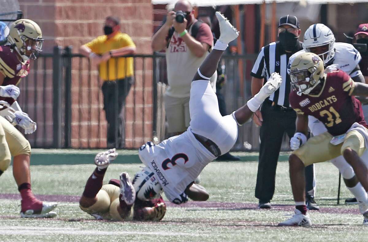 UTSA's Sincere McCormick is upended after a reception in first quarter. UTSA at Texas State on Saturday, September 12, 2020. UTSA 24-7 at halftime.