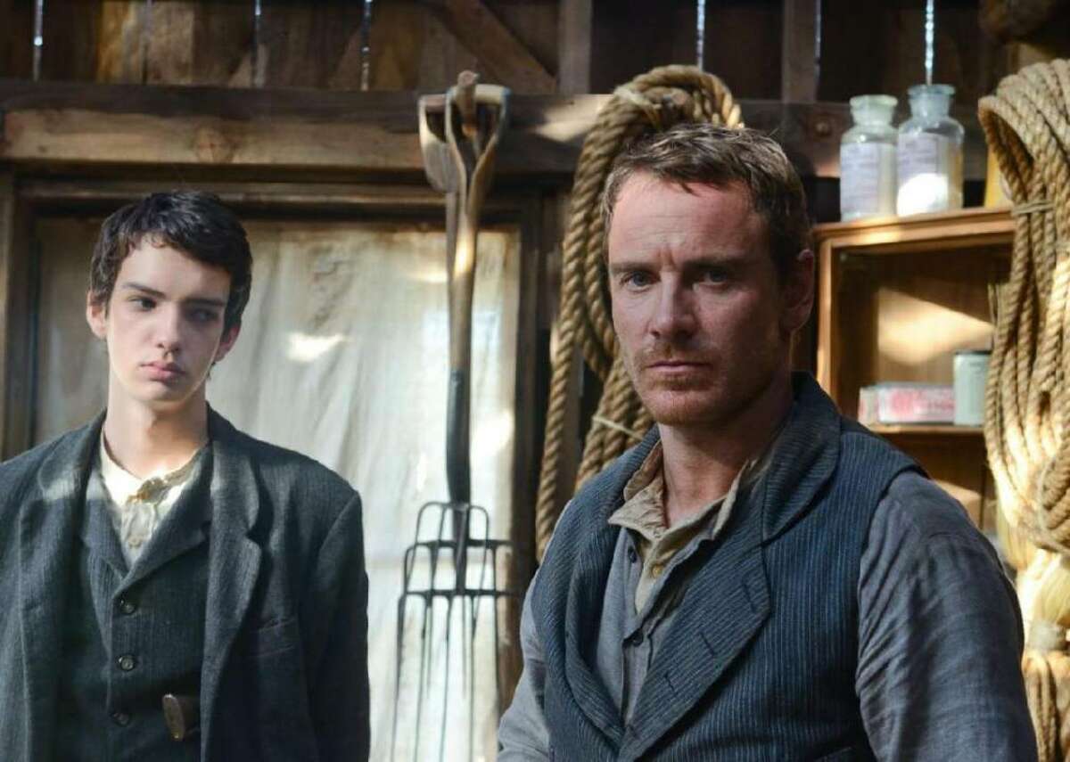 #100. Slow West (2015) - Director: John Maclean - IMDb user rating: 6.9 - Votes: 38,839 - Metascore: 72 - Runtime: 84 min Michael Fassbender plays the quiet, gritty cowboy in this contemporary neo-Western about a Scottish teenager who tracks a fugitive, the girl he loves, across the American countryside in 1873. Ben Mendelsohn stars as the grizzled bounty hunter also on the trail. The familiar tropes, including a gunfight finale and shots of the dead, offer a contemporary redux of the Western’s austere and inescapable poetics of brutality.