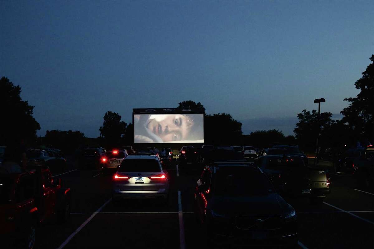 Sundown brings showtime and Ferris Bueller at the drive-in premiere of the new Remarkable Theater on Friday, June 27, 2020, in Westport, Conn.