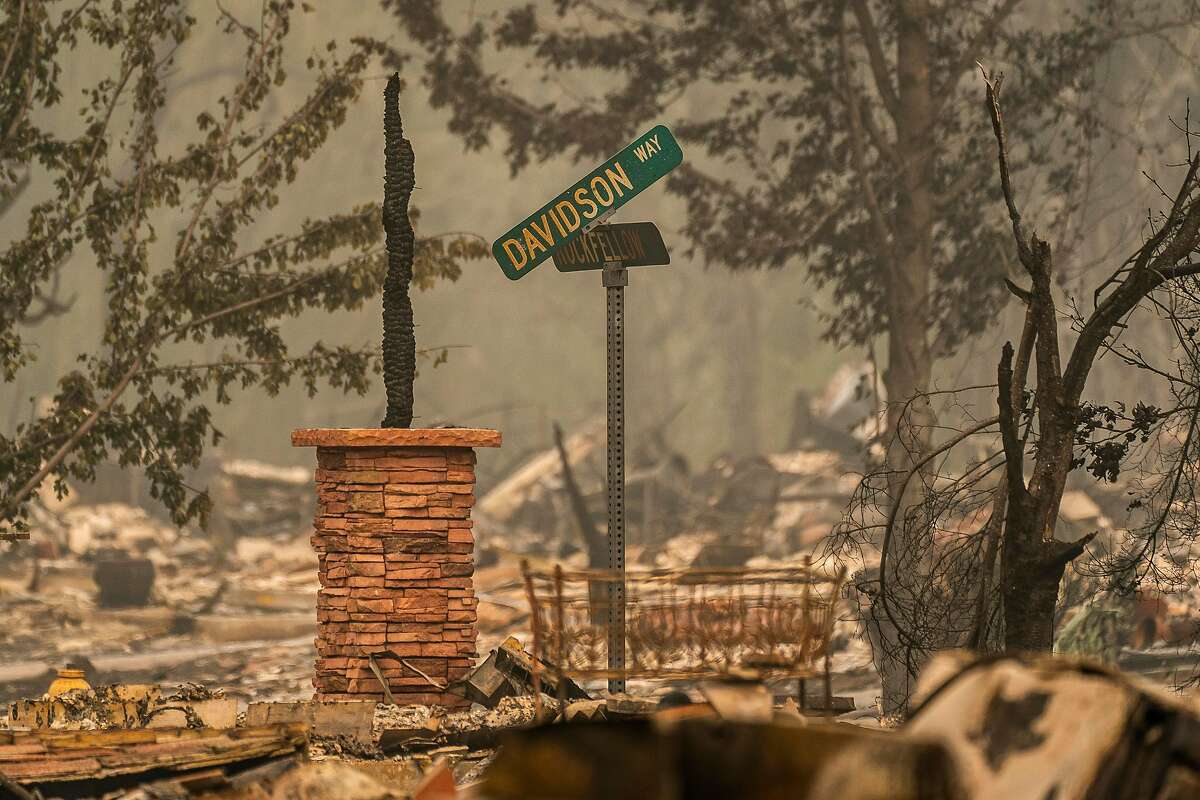 TALENT, OR - SEPTEMBER 13: A burnt street sign dangles on a pole in a neighborhood destroyed by wildfire on September 13, 2020 in Talent, Oregon. Hundreds of homes in Talent and nearby towns have been lost due to wildfire. (Photo by David Ryder/Getty Images)
