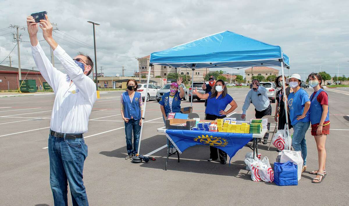 The Laredo Rotary Club gathers outside Texas Workforce Solutions, Wednesday, Sep. 9, 2020, for the Lunch Hour School Supply Drive.