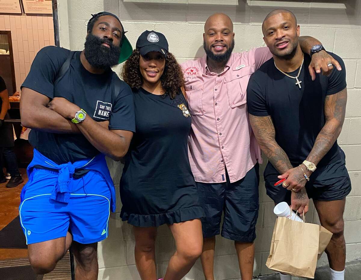 Count James Harden and P.J. Tucker among the celebrity fans of Turkey Leg Hut. Pictured: James Harden, owner Nakia Price, owner Lynn Price and P.J. Tucker.