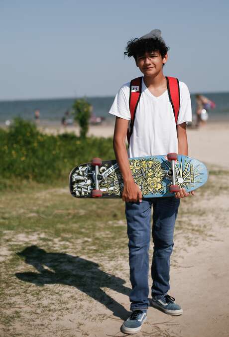 “Just wanted to see who was down here today,” says Taylor Vallejo, 15, who rode his skateboard to the beach. Photo: Elizabeth Conley/Staff Photographer / © 2020 Houston Chronicle