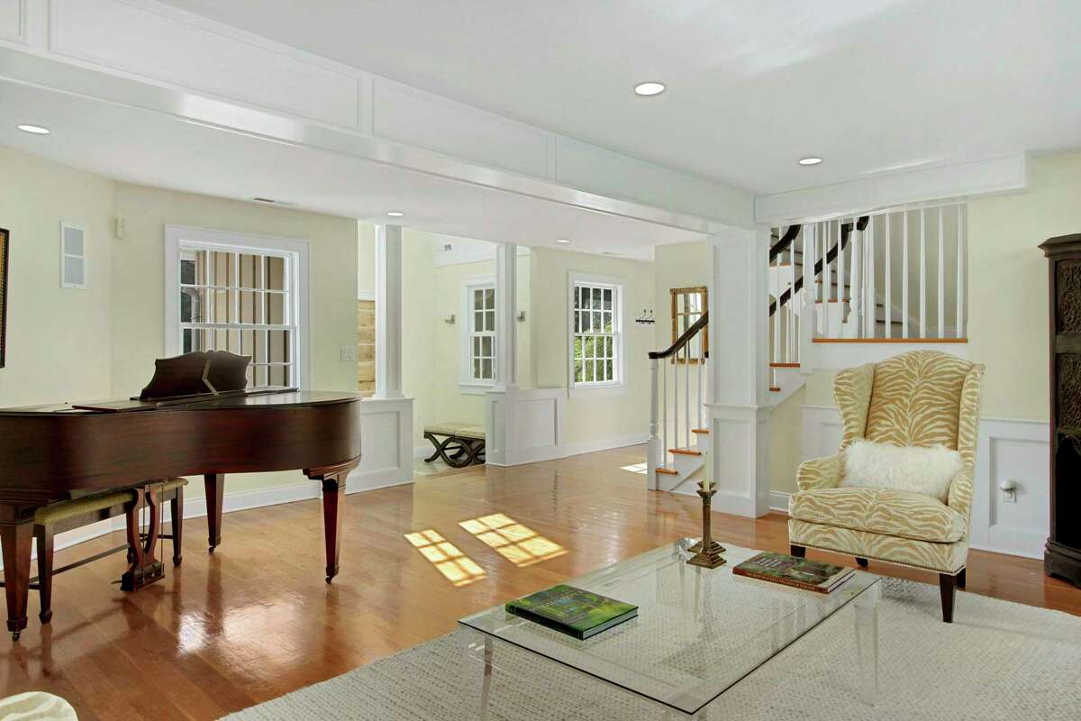 The formal living room can double as a music room. STYLE: Colonial Farmhouse ADDRESS: 61 River Road, Weston PRICE: $1,200,000 ROOMS: 14